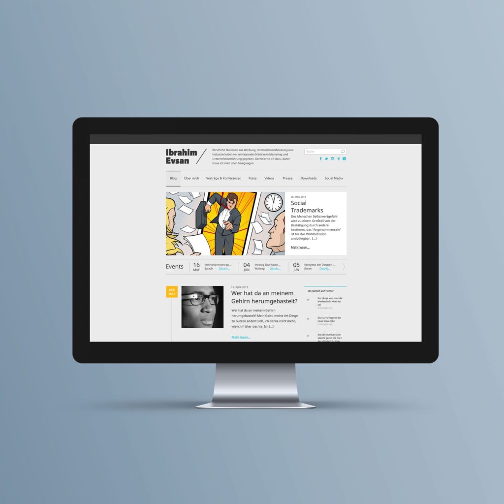 Computer monitor displaying the "Ibrahim Evsan" website redesign, featuring a comic-style illustration of a businessman, a "Social Trademarks" section, and a blog post titled "Wer hat da an meinem Gehirn herumgebastelt?".